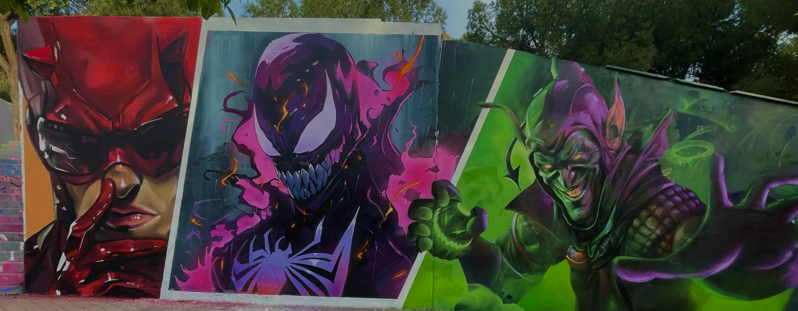 Mural solidario Superhéroes para JuliOne realizado en Pino Montano, Sevilla